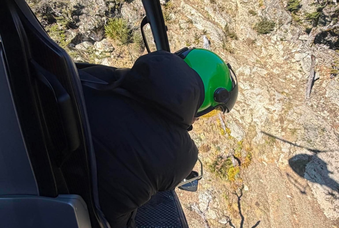 A Heliworks Queenstown pilot negotiating the steep and tricky terrain during the rescue of a hunter above Routeburn Shelter last Sunday 21 June