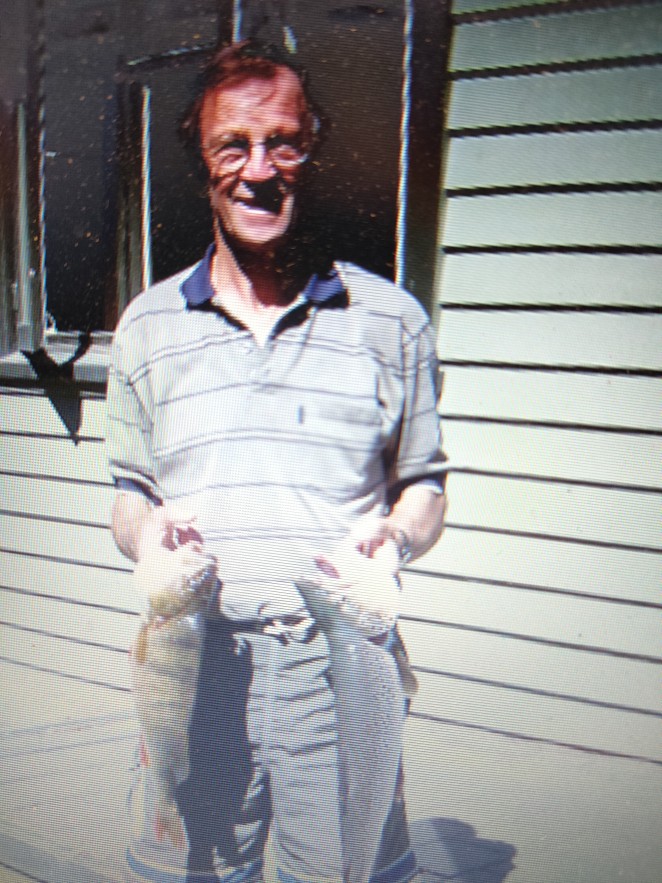 A younger Kerry sporting two trout he caught in Lake Hayes