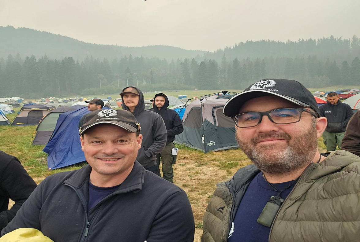 Bobby right with Dunstan Brigade deputy Tony Smith at one of their campsites during the US wildfires