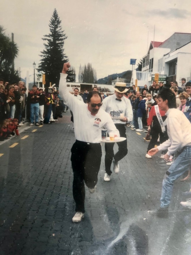 Bruce on fire in the Queenstown Winter Festival Waiters Race in the late 1980s