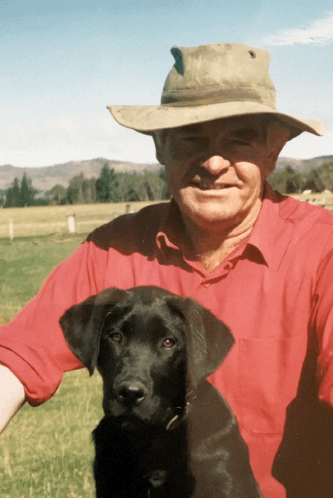Colin and pet dog Pablo down on the farm