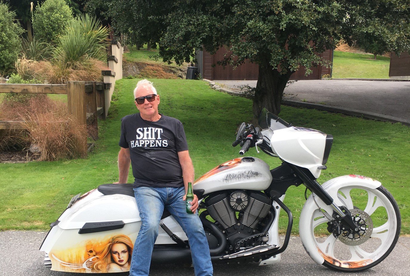 Dennis and his beloved Victory Bagger motorcycle copy