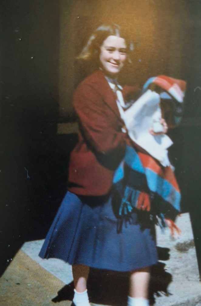 Elaine in Correspondence School uniform headed for camp