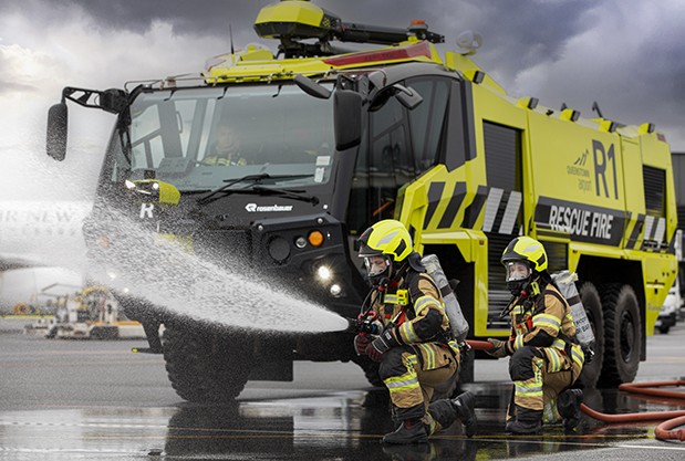Emergency Services firefighters in training with an appliance at Queenstown Airport
