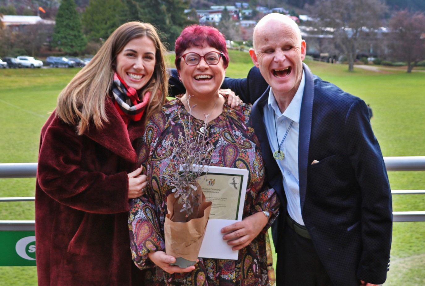 Emma centre with husband Mark and friend Lucy Harding left celebrating after her New Zealand citizenship ceremony last year 