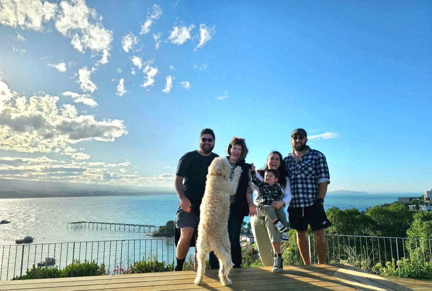 From left James Maree Ana Hamish and grandson Flynn with pet pooch Frankie all celebrating Marees recent 65th birthday