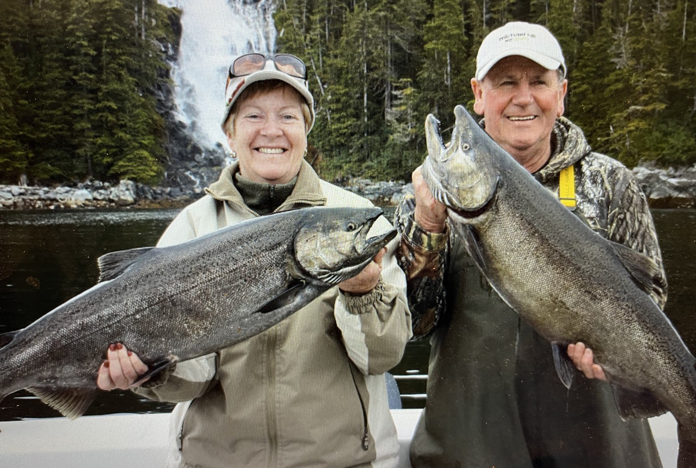 Gary right and wife Lois land the big catch salmon fishing in Alaska in 2010 copy