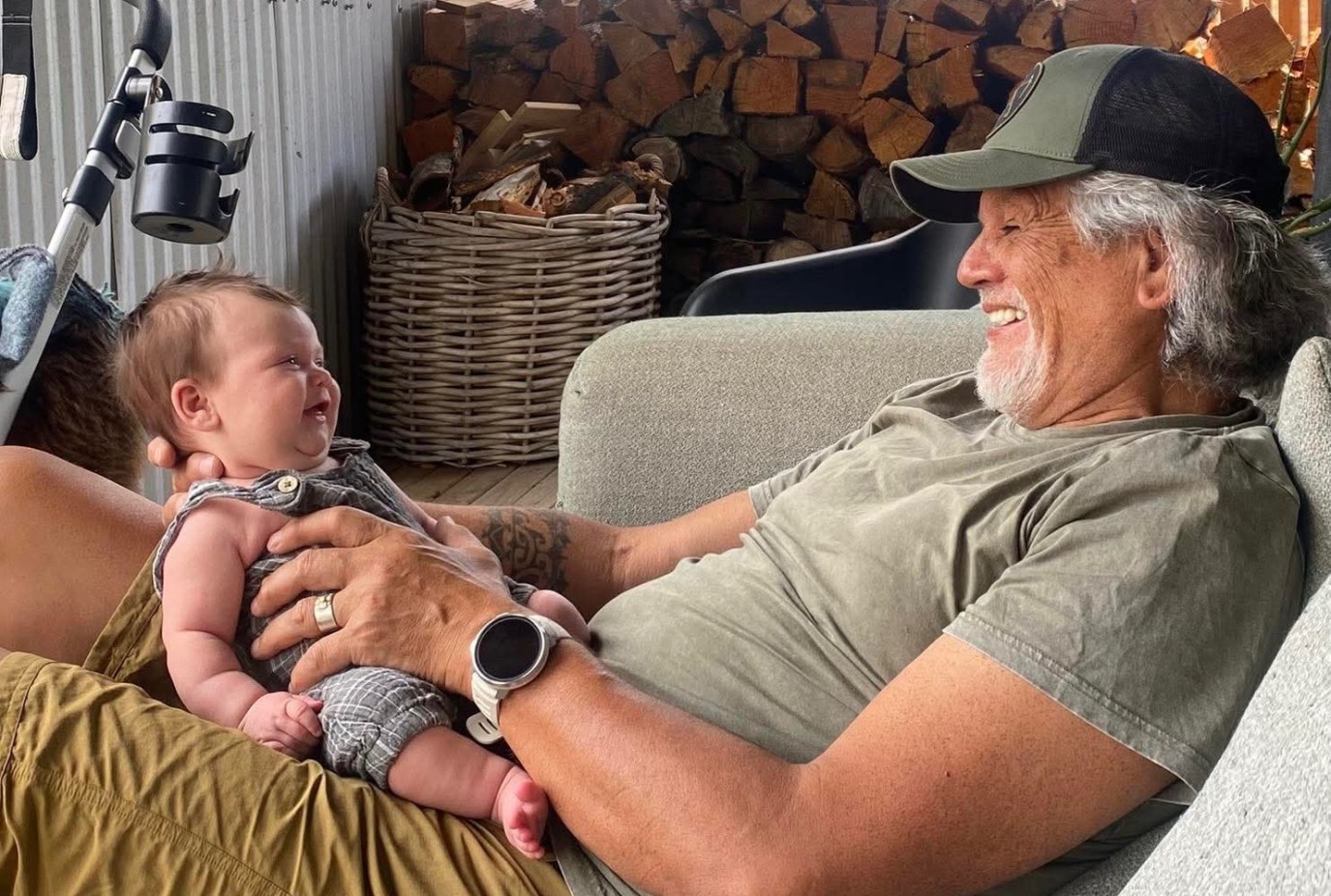 Granddaddy Darryl with little Zinnia 3 months