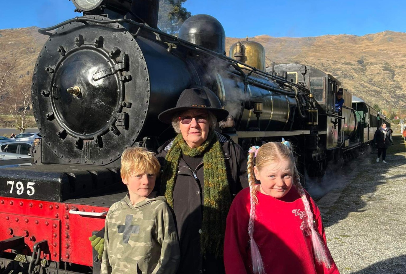 Grandma Elaine with her two grandchildren Tom left and Olivia enjoying the Kingston Flyer