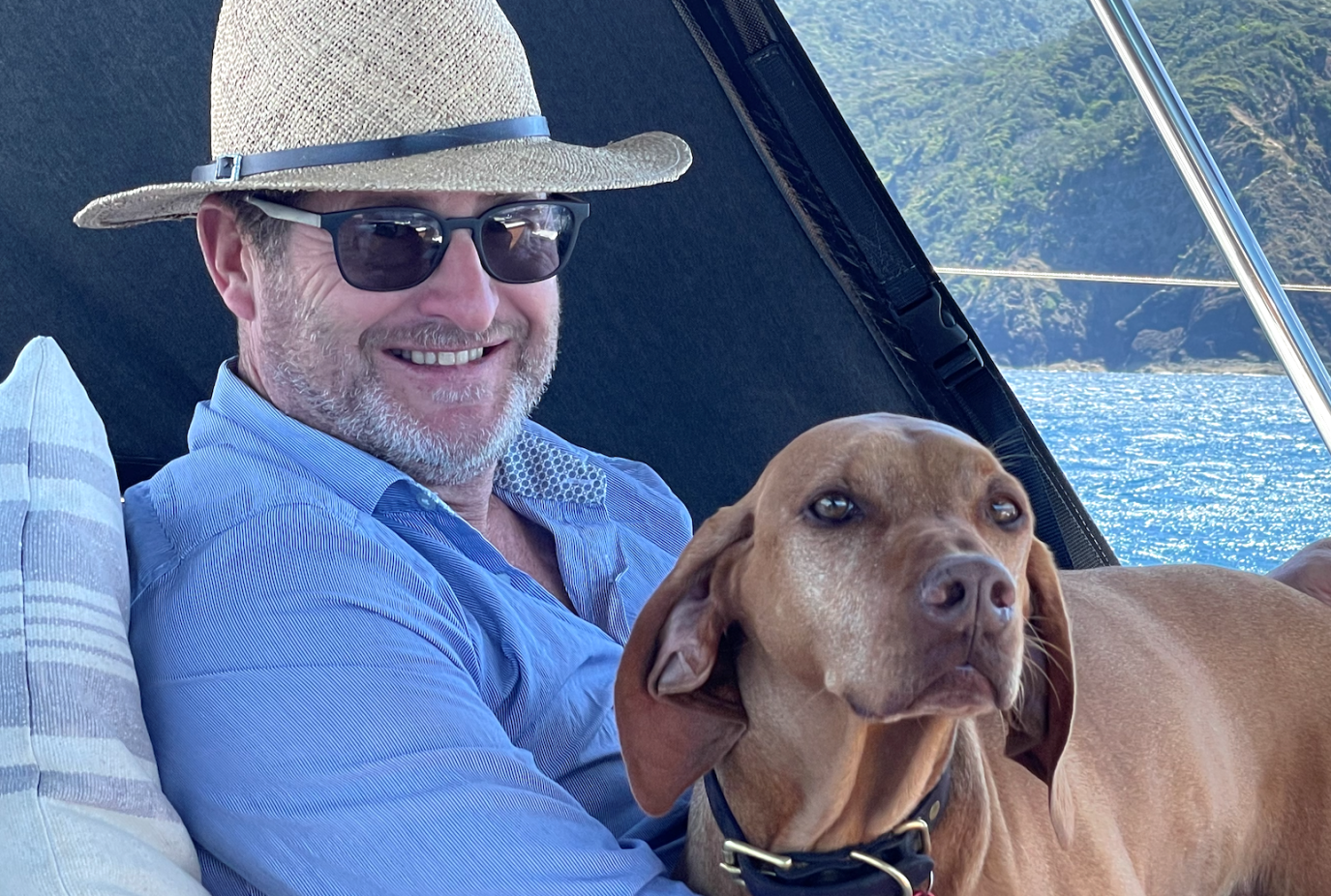 Ivan and dog Molly sailing off Great Barrier Island