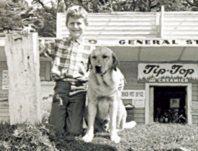 Ivan the dog lover makes friends on holiday at Oakura Bay Store around 1968