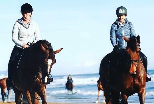 Jan right riding on holiday in Spain with daughter Olivia