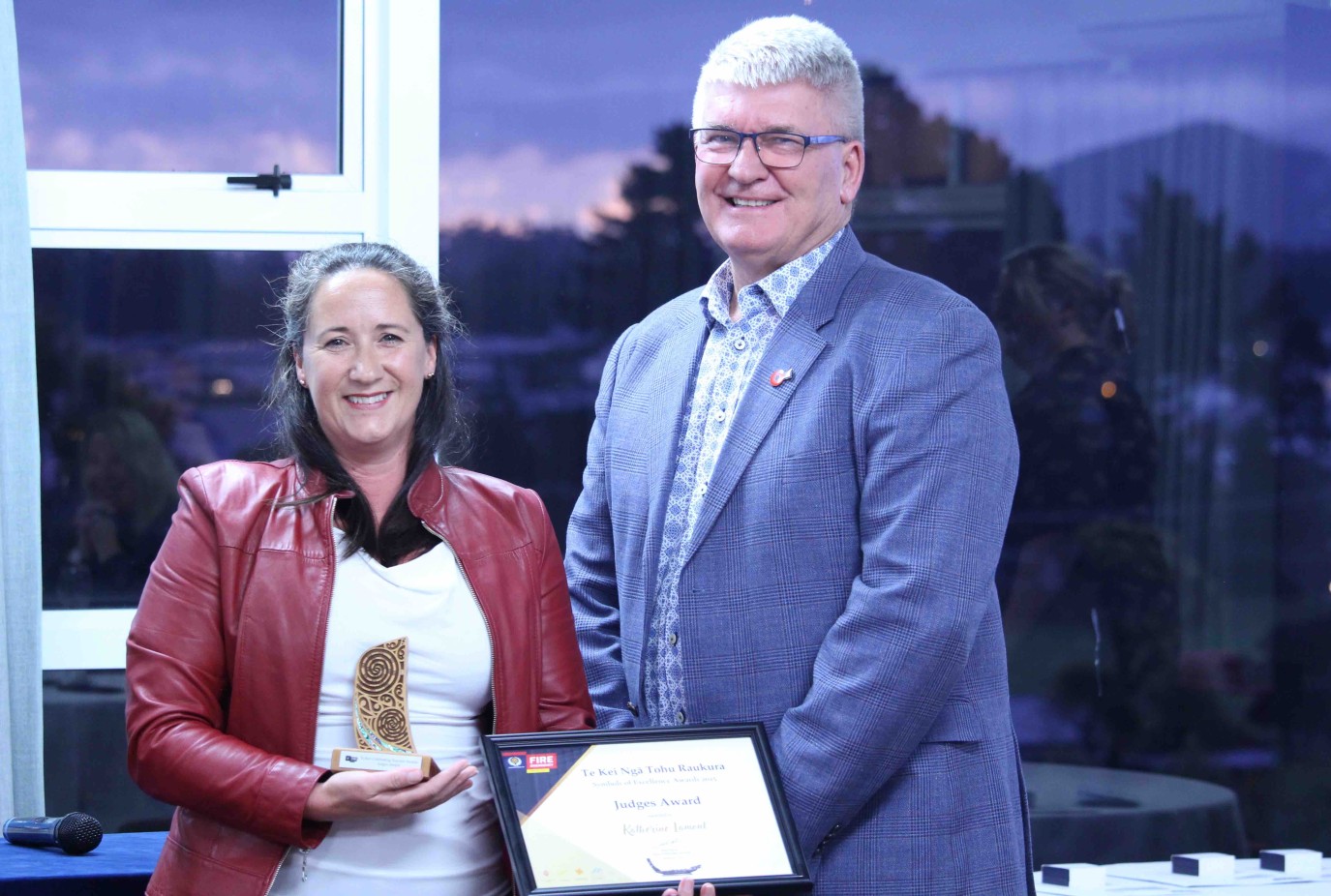 Katherine Lamont left after receiving her Judges Award in Dunedin with FENZ Otago Local Advisory Committee representative and Cromwell chief fire officer Neil Gillespie
