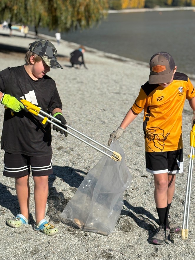Local kids helping out at Earth Day beach clean up Lake Wanaka