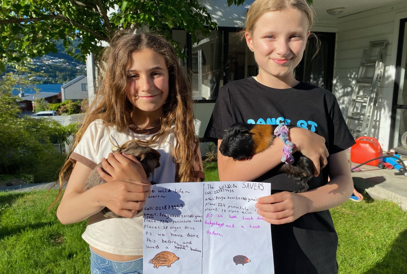 Luella Sharpe left and Freya DaviesJ both 10J with Cheeky and ChipJ ready of Kelvin Heights Wildlife SaversJ ready to welcome any ailing creatures needing help.2