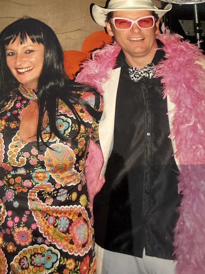 Mel and Erich getting into the swing of a fancy dress party