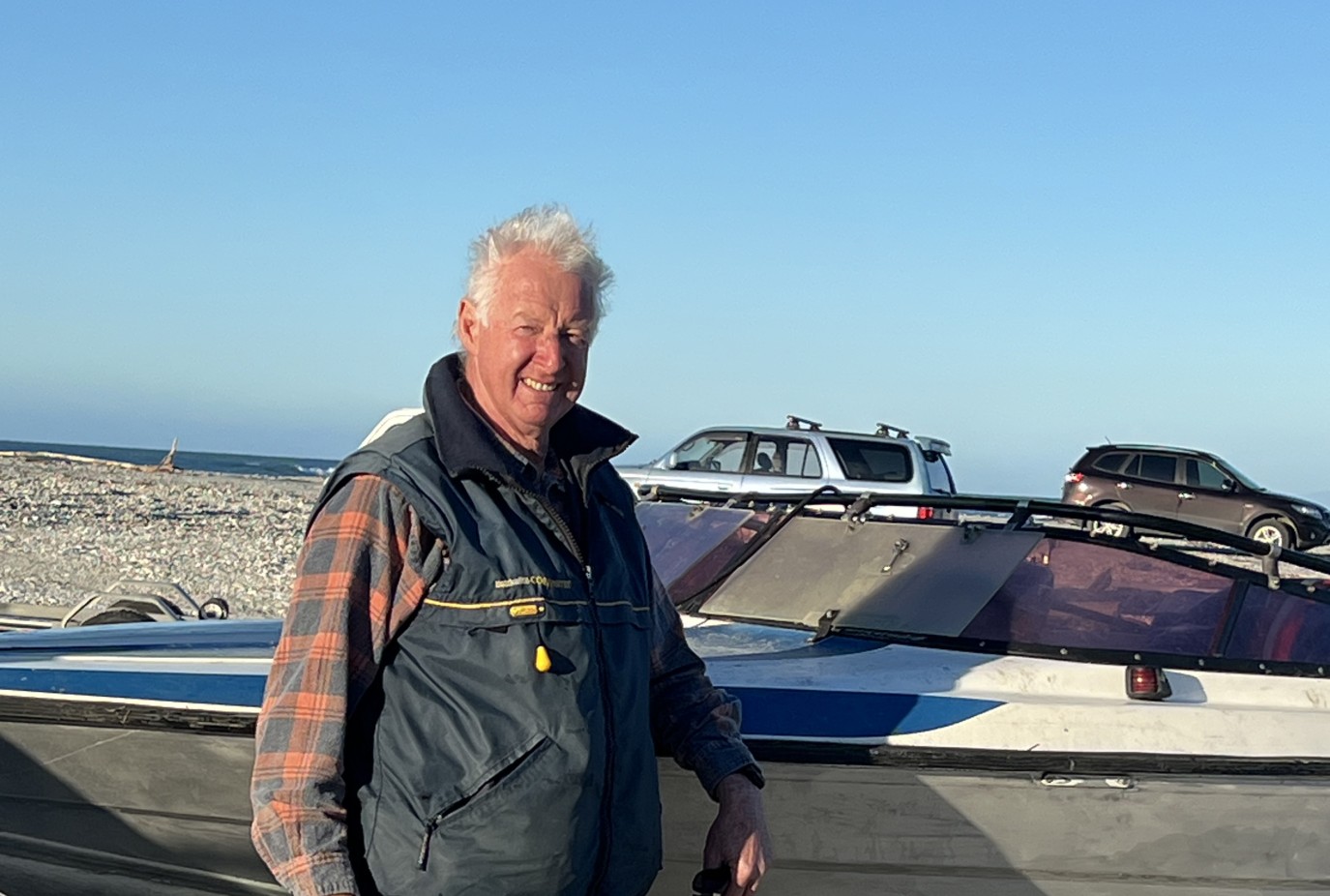 Mike heading out on the boat near Jacksons Bay recently. copy