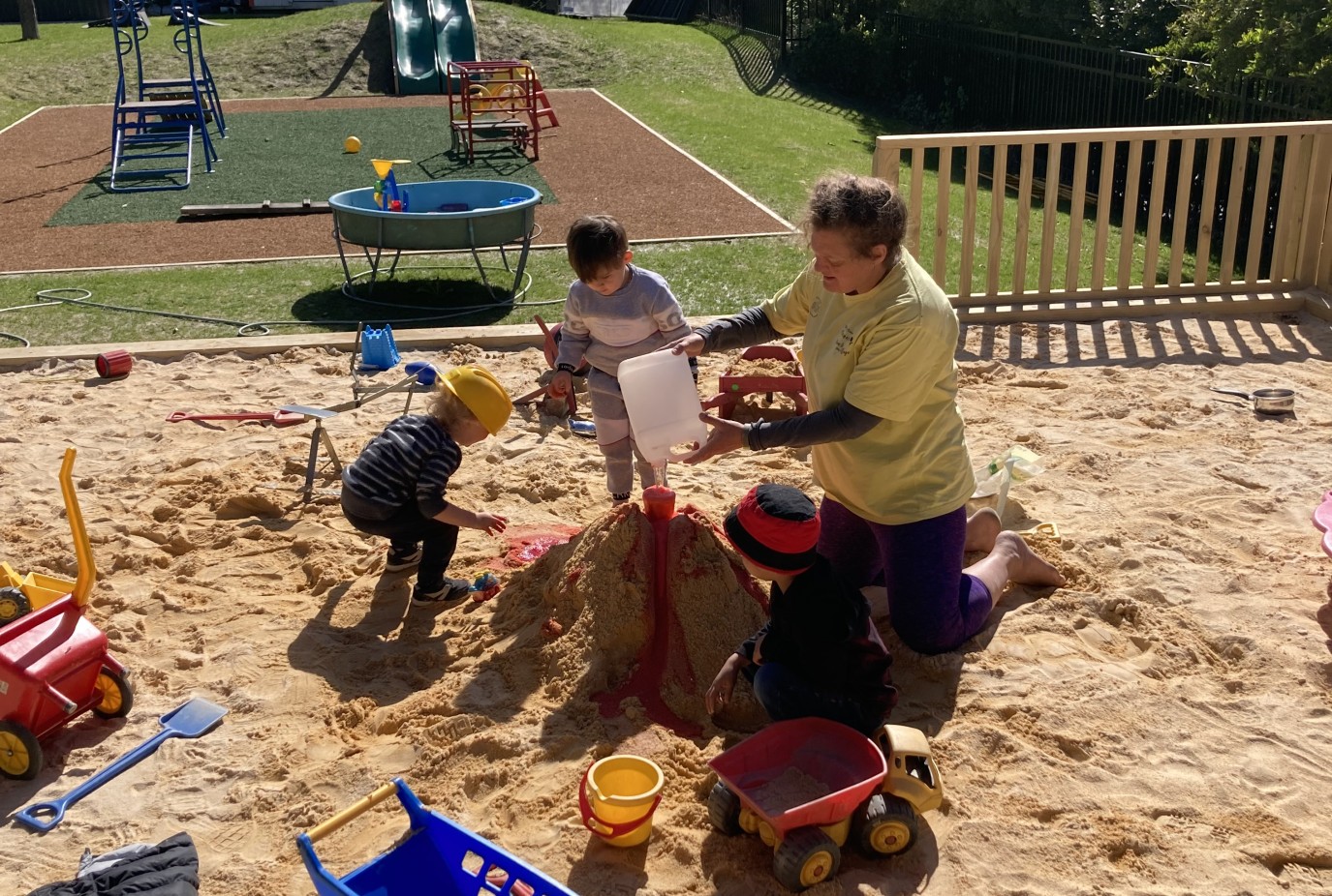 Queenstown Playcentre session facilitator Alex Hide enjoys some play with the children on the new site