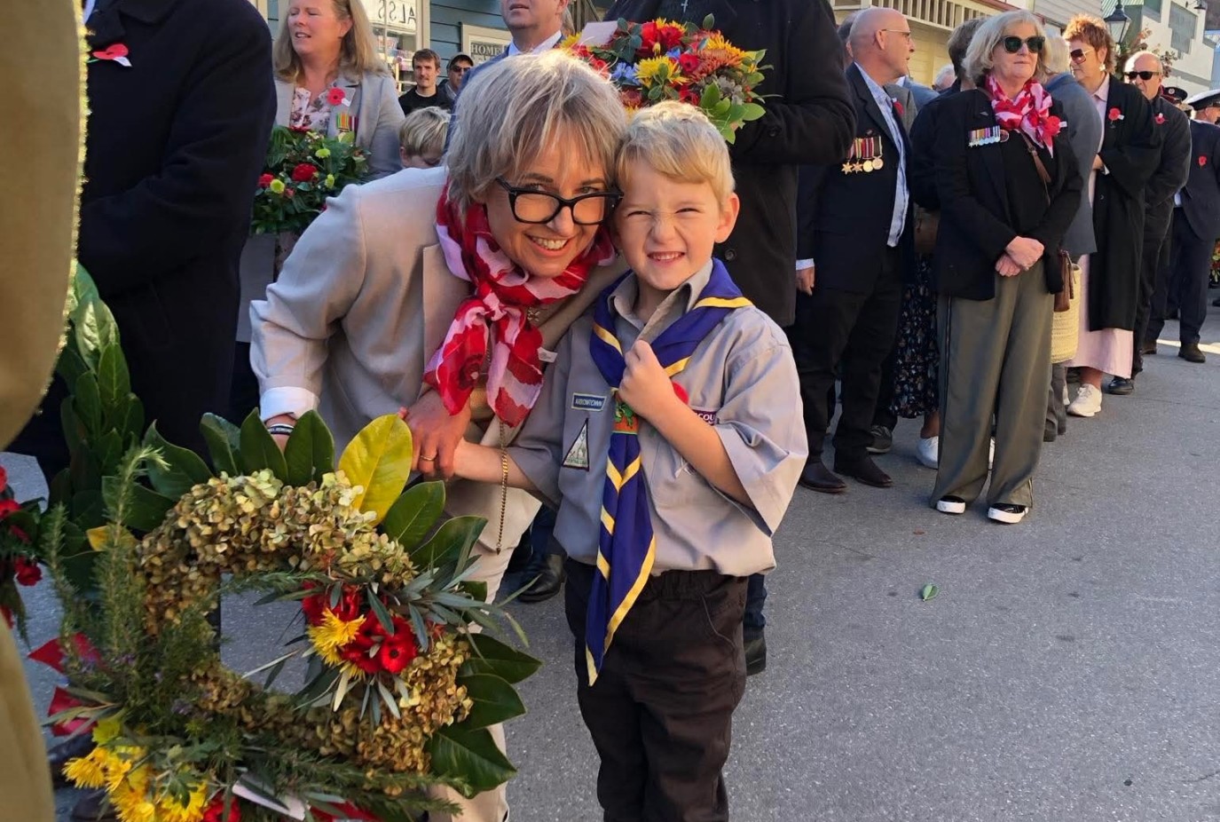 Rosemary with her grandson Elijah Chalmers during Arrowtown ANZAC Day commemorations