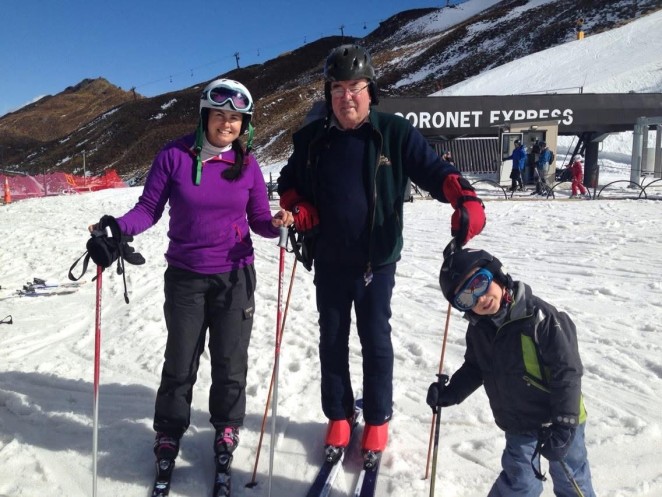 Simon centre on his 65th year skiing with daughter Bec Stanley and grandson Willi Stanley