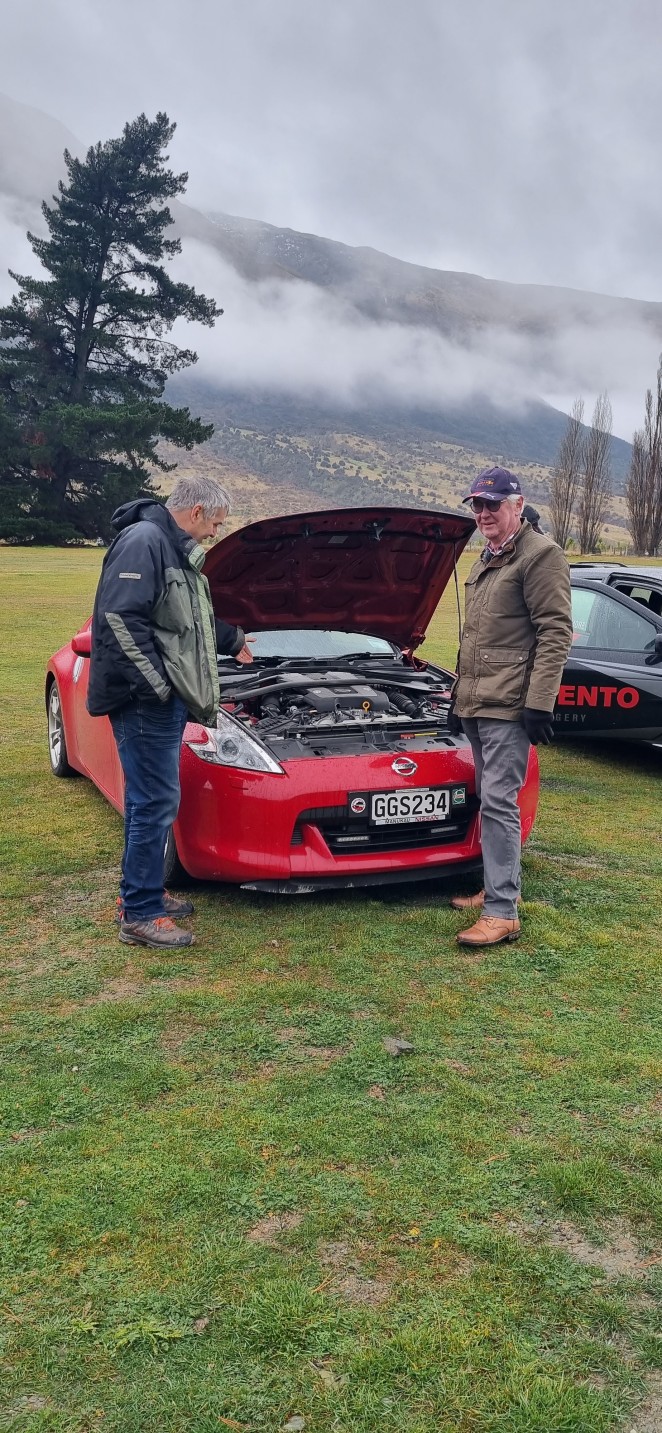 Stuart right and Nigel Ede of the Queenstown Car Club do a quick check on Stuarts Nissan 3702