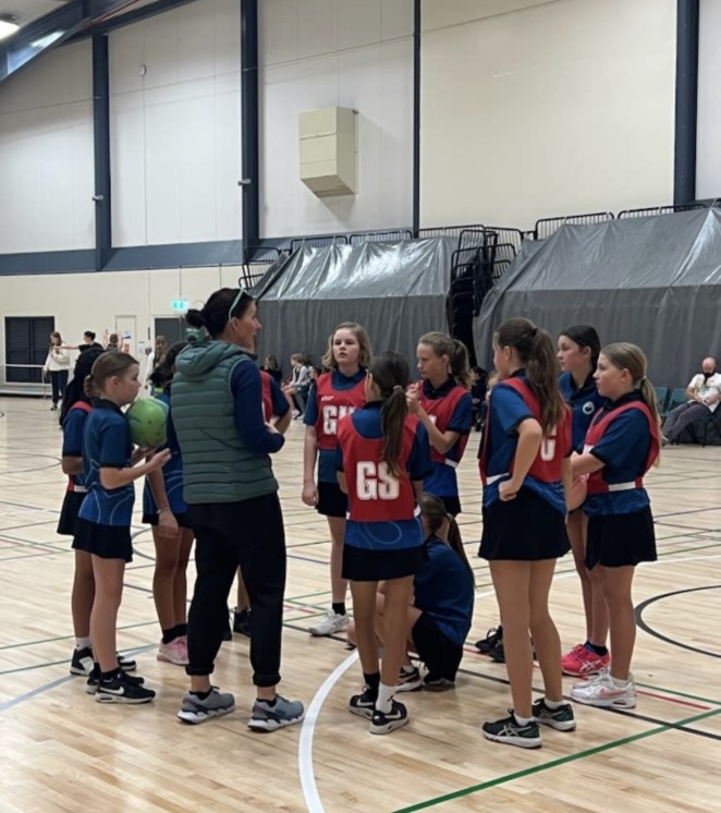 Team talk at Te Kura Whakatipu o Kawarau School netball practice.