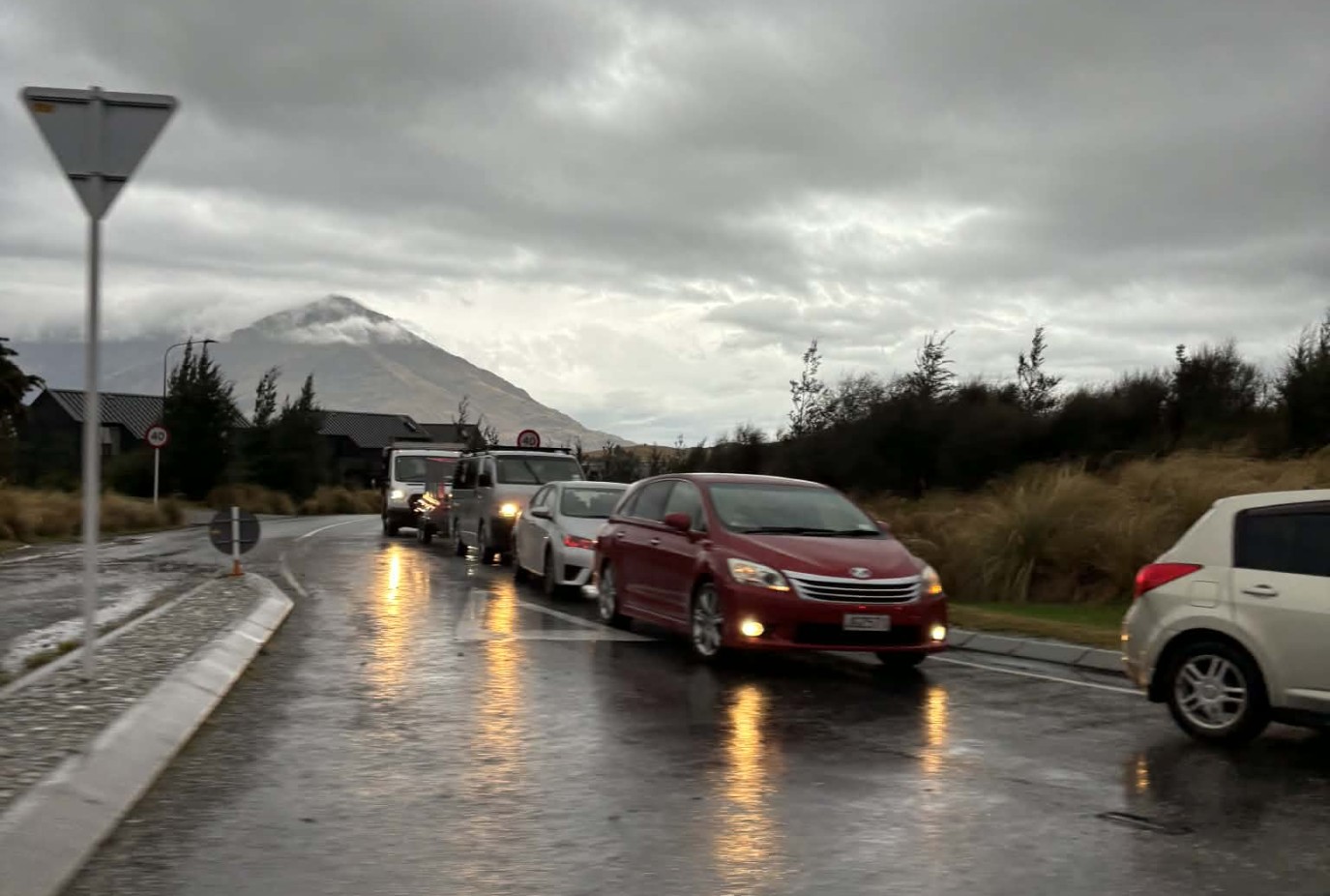 The beginning of a long line of traffic heading out from Hanleys Farm trying to access the State Highway during rush hour this morning. Photo Supplied