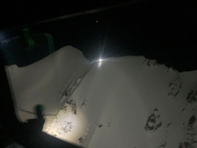 The two stranded climbers near the summit of Mount Cook using head torches to guide an Otago Southland Rescue Helicopter after Monday nights tragedy.Photo Helicopters Otago