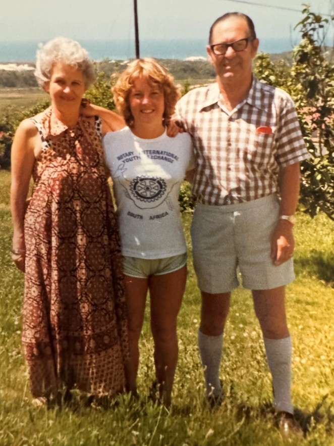 Tracy centre in her teens with one of her sets of host parents during her Rotary Exchange to South Africa