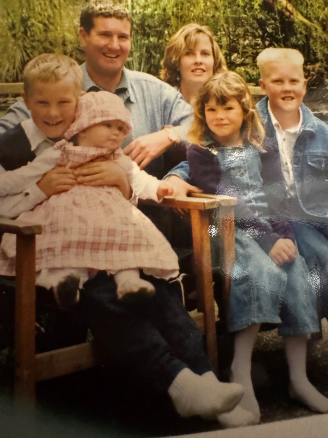 Tracy right rear with the family from left Rob holding Mikaela Steve visiting niece Sarah and Matt in their early days in Queenstown