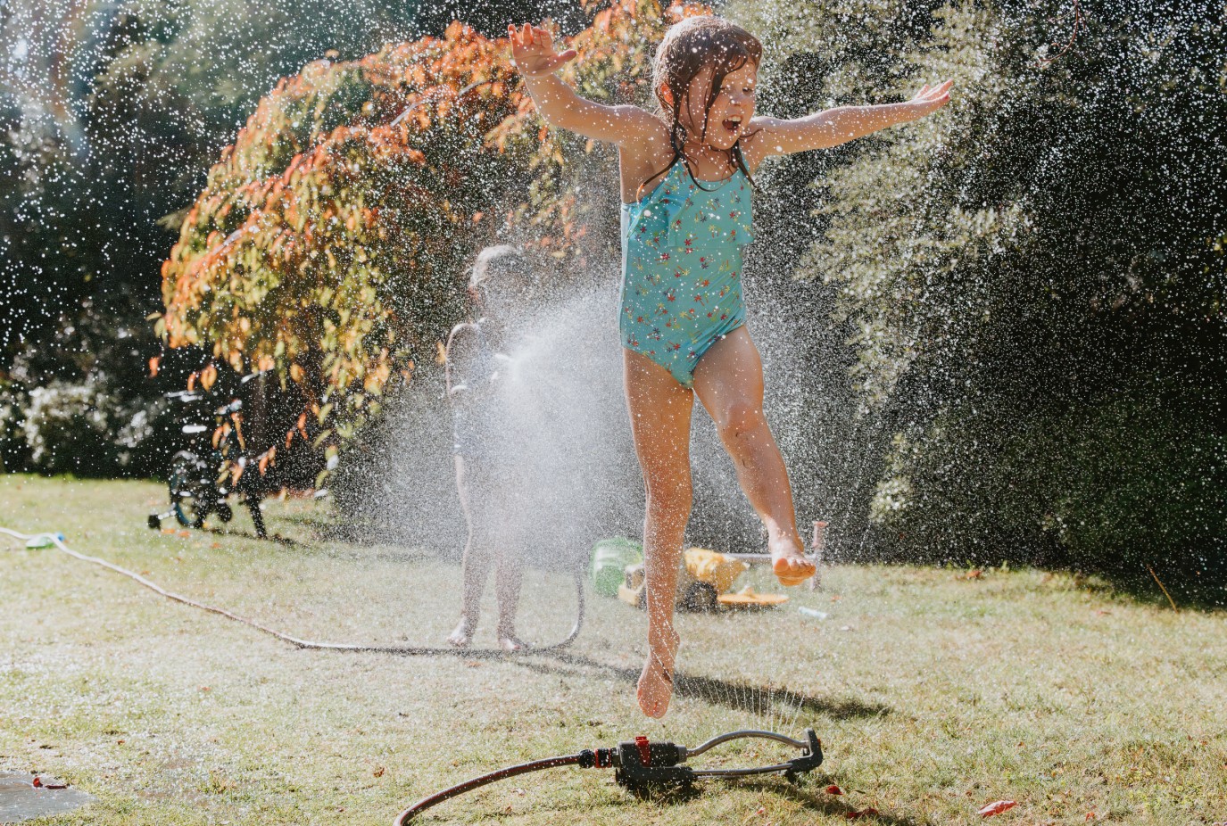 WAI Wanaka girls in sprinkler credit Deanna Gerlach v2