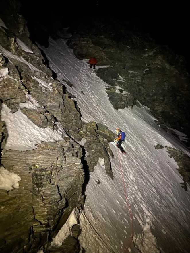 Wakatipu Alpine Cliff Rescue Team members Jono Gillan top and Karl Johnson bottom make their way up a steep snowy slope on Mount Earnslaw to rescue two Aussie climbers late on Sunday v5.