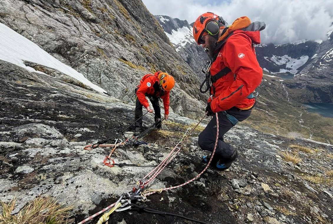 Wakatipu Alpine Cliff Rescue Team members Karl Johnson and Nick Black preparing to lower the rescuer on Sabre Peak.Photo Wakatipu Alpine Cliff Rescue