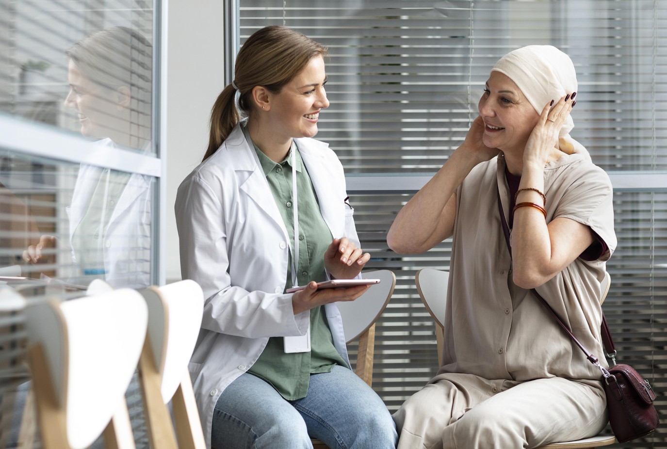 middle aged woman with skin cancer talking with her doctor copy v3